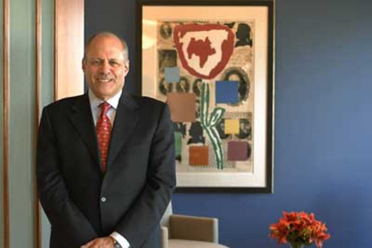 Alan Hoffman poses at his office. (Jonathan Wilson/Staff Photographer)