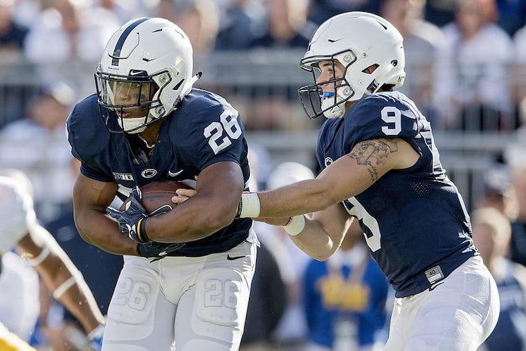 Saquon Barkley (26) and Trace McSorley (9) have come out in support of Penn State football coach James Franklin.