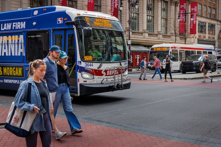 Buses crisscross the Avenue of the Arts at Broad and Walnut Sts., Aug. 8, 2025.