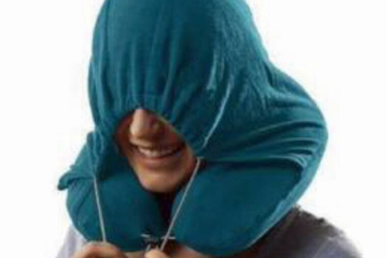 A roomy soft fleece hood is sewn to the outer perimeter of the fleece-covered memory foam neck ring, providing extra warmth for your head.