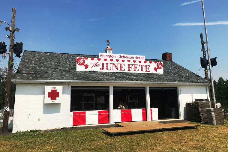 Find red and white, June Fete's signature colors, scattering the grounds of massive country fair.
