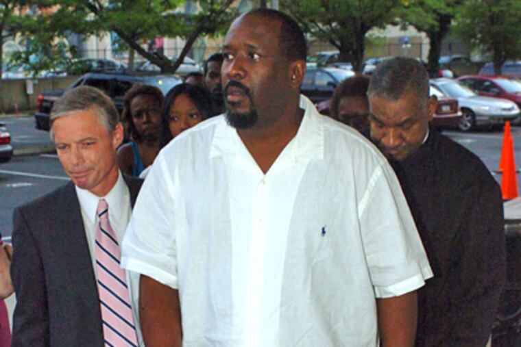 Will “Pooh” Hook Jr. (center), is also known as James Wilson and Keith Epps. (James Heaney / Staff Photographer)