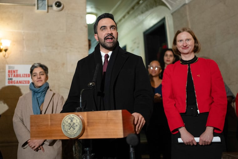 Mayor Zohran Mamdani speaks during a news conference with newly appointed housing official Cea Weaver (right) on New Year's Day in New York.