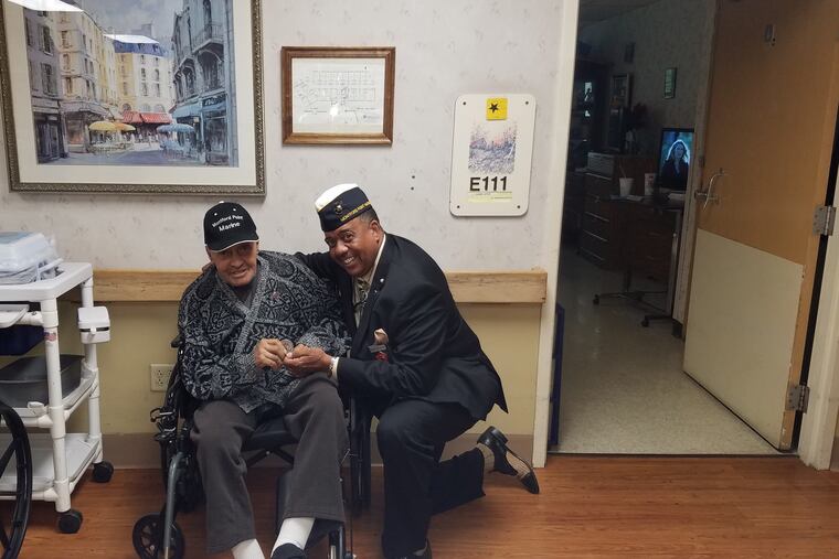 Sgt. Thomas Snowden (left) with Joseph H. Geeter III, National Public Relations and Legislative Officer for the Montford Park Marine Association