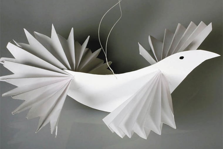 Create a white dove in honor of MLK’s peaceful message.