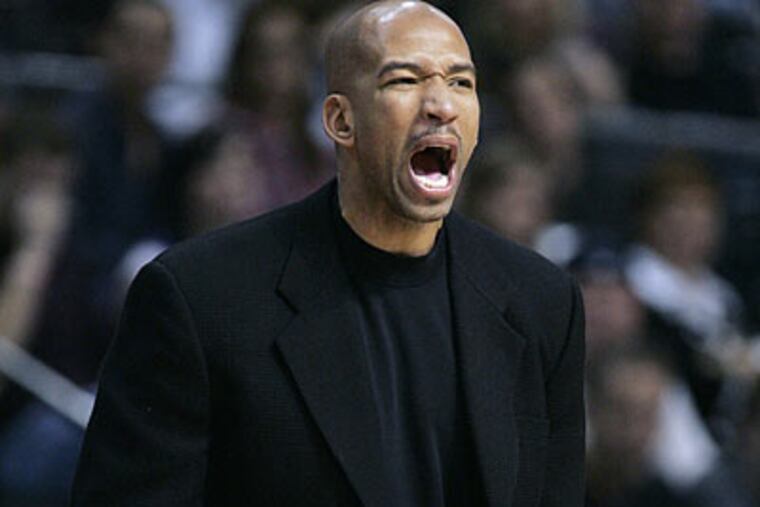 Monty Williams played in 21 games with the Sixers in 2002-03. (Duane Burleson/AP file photo)