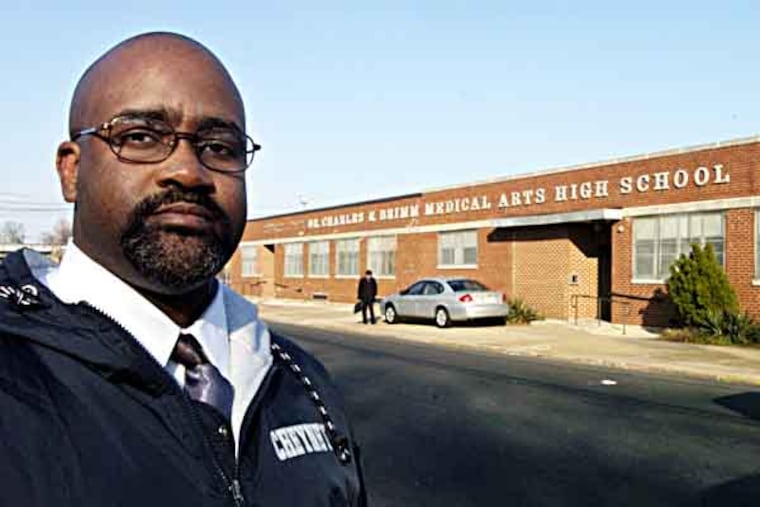 This is a portrait of principal Joseph Carruth standing outside his school, Dr. Charles E. Brimm Medical Arts High School in Camden. March 23, 2006. (Sarah J. Glover / Inquirer). EDITORS NOTE: JCARRUTH26A 81239. Interview with Camden high school principal who outlined his allegations that he was pressured to change test scores for last year's state tests. REP/ Burney 1 of 8