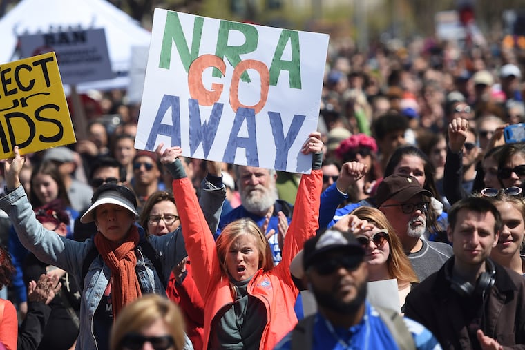 FILE - In this March 24, 2018, file photo, crowds of people participate in the March for Our Lives rally in support of gun control in San Francisco. The National Rifle Association sued San Francisco on Monday, Sept. 9, 2019, over the city's recent declaration that the gun-rights lobby is a "domestic terrorist organization." (AP Photo/Josh Edelson, File)