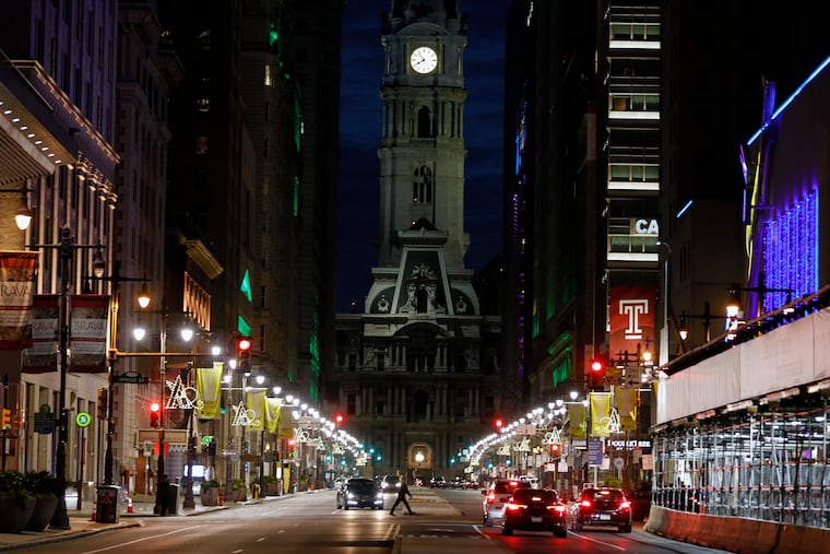 With the Wilma Theater on the right and Merriam and Academy of Music on left, South Broad Street Saturday night was uncharacteristically quiet and sparse as the coronavirus pandemic kept the city's arts venues dark.