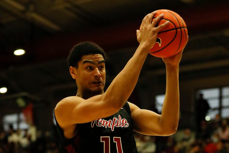 Temple forward Nick Jourdain holds the basketball against Saint Joseph's on Saturday, December 11, 2021.