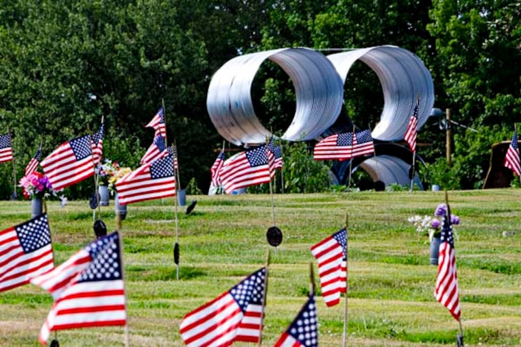 View of Route 295 construction equipment adjacent to New St. Mary’s Cemetery, Browning Rd., Bellmawr, July 24, 2014. ( DAVID M WARREN / Staff Photographer )