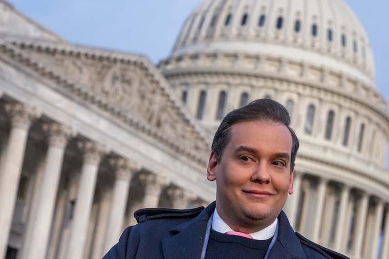 Rep. George Santos, R-N.Y., meets with reporters Thursday outside the U.S. Capitol in Washington.