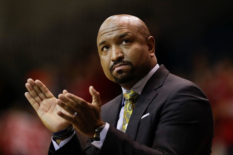 La Salle Head Coach Ashley Howard claps during a break against Dayton on Jan. 2.