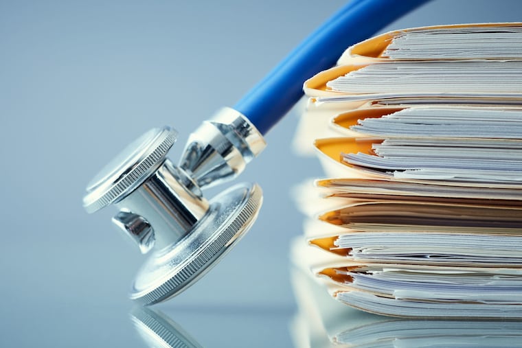 Federal and state authorities are looking into allegations that a Main Line Women's Healthcare employee used a personal cellphone to capture confidential information from medical charts, potentially affecting more than 800 patients.