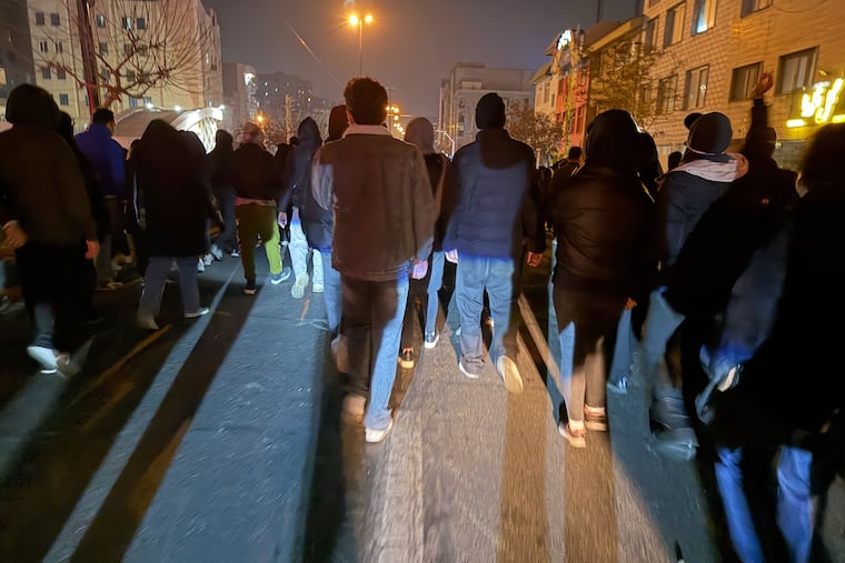 Iranians attend an anti-government protest in Tehran last week.