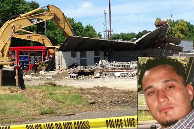 Worker Jose David Ortega was killed in a collapse of a former Blockbuster building under demolition in Cherry Hill on Friday, June 20, 2014. A preliminary report indicates the death was accidential. (Julia Terruso/Staff)