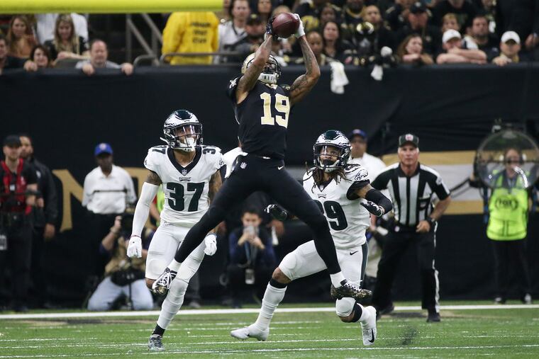 New Orleans Saints wide receiver Ted Ginn Jr. (19) catches a pass in front of Eagles safety Tre Sullivan (37) and cornerback Avonte Maddox (29).