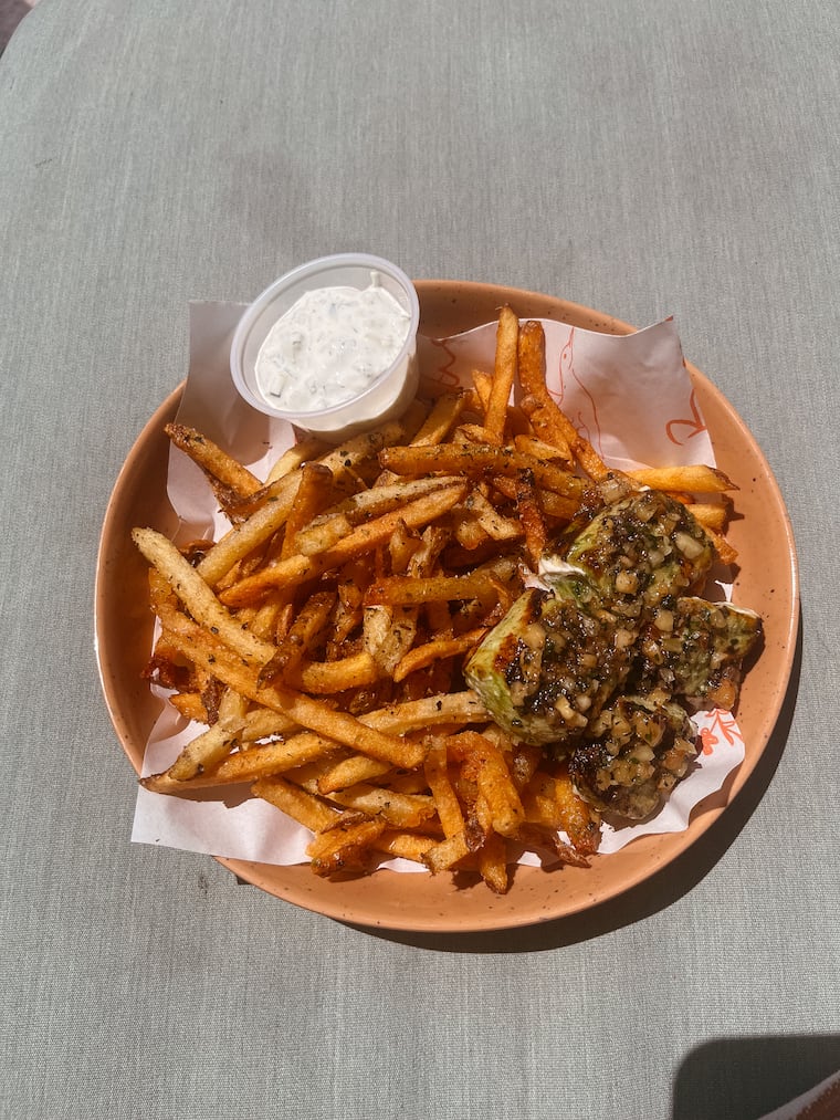 Emily Bloch enjoyed Bastia's swordfish skewers so much, she ordered them the following day in their lunch format: swapping black rice for a bed of traditional-cut fries.