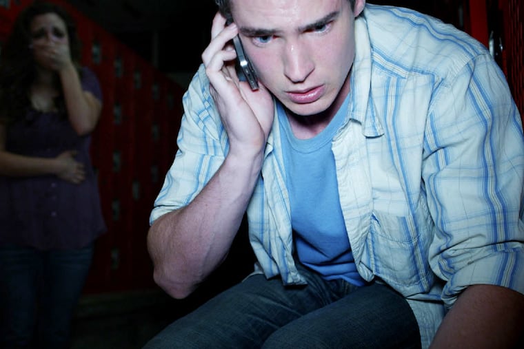 Reese Mishler and Pfeifer Brown (background) star in the horror flick "The Gallows," set mostly in a high school theater. (Warner Bros. Pictures)