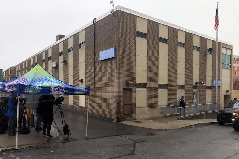 Members of the media gather outside of Altoona Police Department where a man with a gun thought to be similar to the one used in the killing of UnitedHealthcare CEO Brian Thompson has been taken into police custody for questionin, Monday, Dec. 9, 2024, in Altoona, Pa.