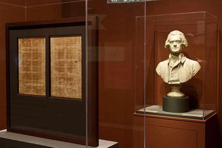 Jefferson's handwritten draft of the Declaration with a bust by Jean-Antoine Houdon on display in the exhibition "Jefferson, Philadelphia, and the Founding of a Nation" at the American Philosophical Society Museum. (RON TARVER / Staff Photographer)