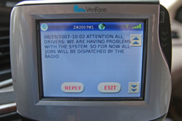 One taxi's GPS screen says the system is having problems. The contractor says the failure rate is minimal.