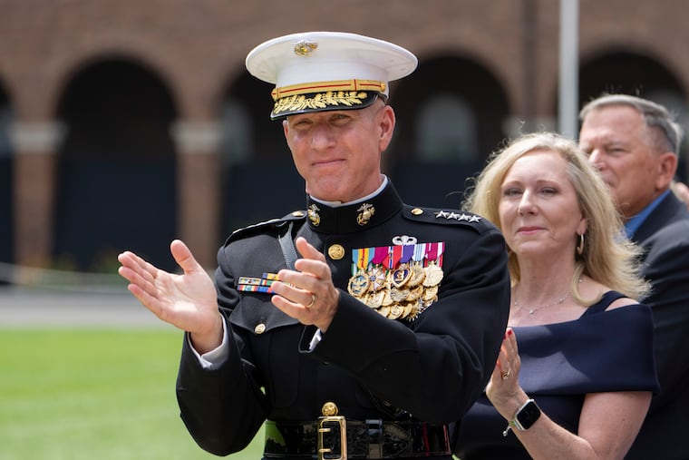 FILE - Acting Commandant of the U.S. Marine Corps Gen. Eric Smith applauds during a relinquishment of office ceremony for U.S. Marine Corps Gen. David Berger on July 10, 2023, at the Marine Barracks in Washington. Smith, the commandant of the Marine Corps, had open heart surgery on Monday, Jan. 8, 2024, and is now expected to return to full duty as the service's leader, the Corps said in a statement.(AP Photo/Manuel Balce Ceneta, File)