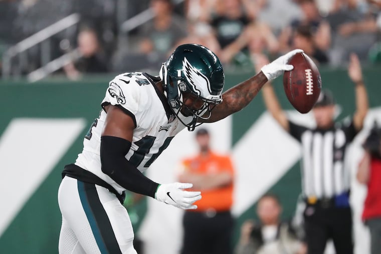Eagles running back Kenneth Gainwell spikes the football after scoring a first quarter touchdown against the New York Jets in a preseason game on Friday, August 27, 2021 in East Rutherford, N.J.