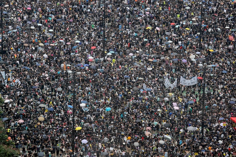 Protesters gather at Victoria Park in Hong Kong on Sunday, Aug. 18, 2019. Thousands of people streamed into a park in central Hong Kong on Sunday for what organizers hope will be a peaceful demonstration for democracy in the semi-autonomous Chinese territory.