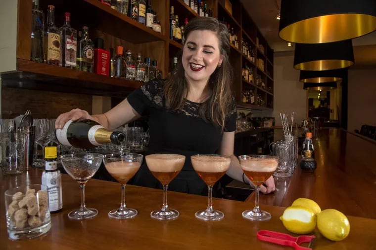 Bartender Alison Hangen, 26, prepares champagne cocktails at Oloroso restaurant.
