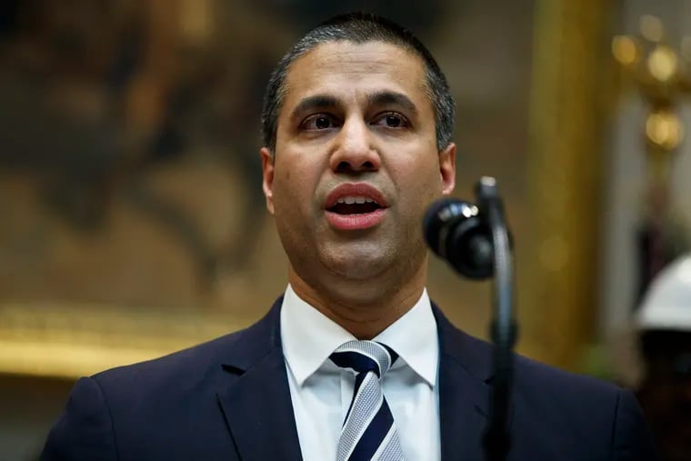 FILE photo shows FCC chairman Ajit Pai, who on Wednesday proposed to let phone carriers block robocallers by default. The measure could be adopted as early as June.