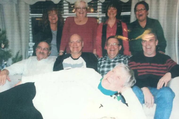 Elizabeth Corcoran (front) with her eight children, clockwise from rear left: Anne Corcoran-Petela, Lisa Corcoran, Mary Corcoran-Pody, and Patricia Ryzinski, Larry, Tim, Mike, and Frank Corcoran Jr.