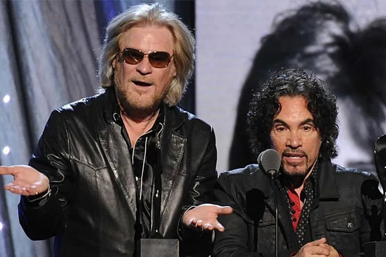 After speaking at their induction , Daryl Hall (left) and John Oates rocked the house in Brooklyn. (AP)