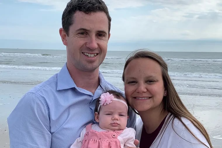 Brendan, Danielle and baby Claire in Avalon, on the same beach where the couple got engaged in 2015.
