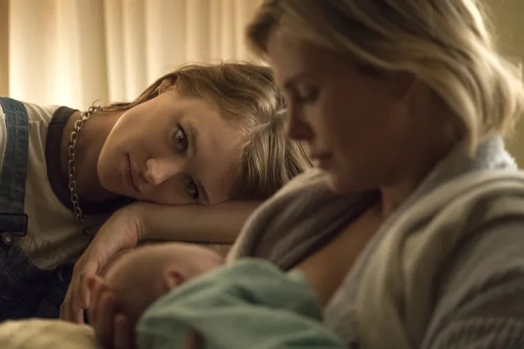 Mackenzie Davis (left) and Charlize Theron in ‘Tully.’