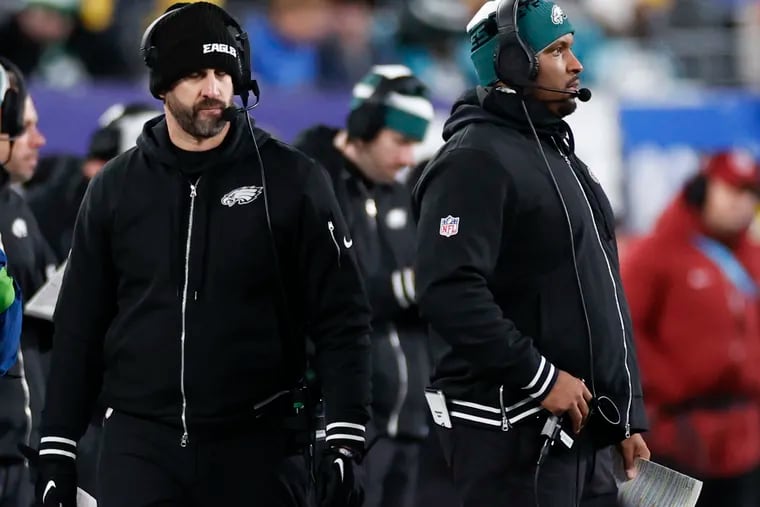 Eagles coach Nick Sirianni (left) and offensive coordinator Brian Johnson during the loss to the New York Giants on Sunday.