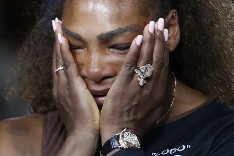 Serena Williams reacts during the trophy ceremony in the women's final of the U.S. Open tennis tournament, Saturday, Sept. 8, 2018, in New York. Naomi Osaka, of Japan, defeated Williams.