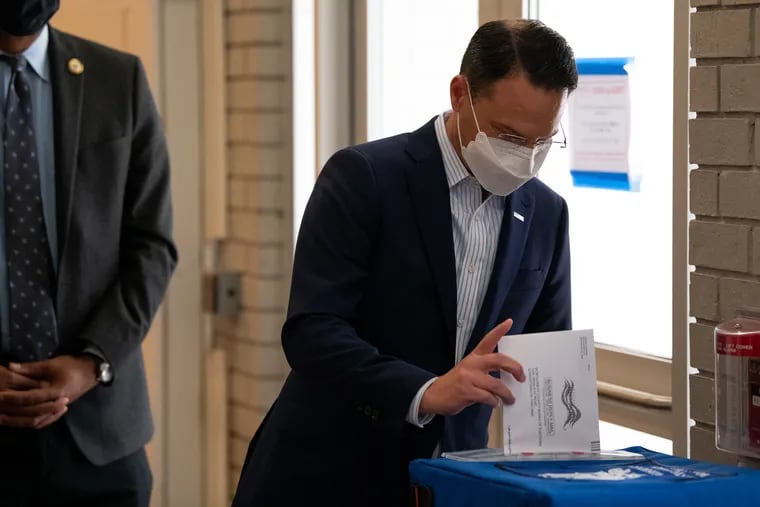 Pennsylvania Attorney General Josh Shapiro casts his mail ballot for the 2020 election on Wednesday in Norristown, Pa.