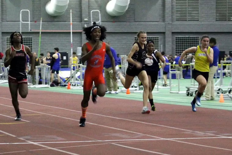 In this Thursday, Feb. 7, 2019 photo, Bloomfield High School transgender athlete Terry Miller, second from left, wins the final of the 55-meter dash over transgender athlete Andraya Yearwood, left, and other runners in the Connecticut girls Class S indoor track meet at Hillhouse High School in New Haven, Conn. In the track-and-field community in Connecticut, the dominance of Miller and Yearwood has stirred resentment among some competitors and their families. (AP Photo/Pat Eaton-Robb)
