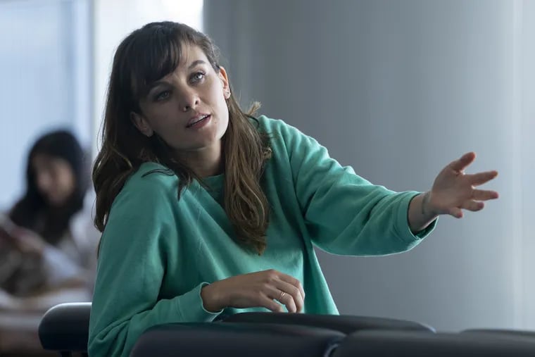 Frankie Shaw, creator and star of Showtime's "SMILF," in a scene from the second-season premiere. Shaw commissioned 10 silk-graffiti pieces from Philadelphia artist Aubrie Costello to use in episodes of the show.