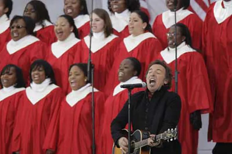 Singer Bruce Springsteen performs at the "We Are One" Opening Inaugural Celebration at the Lincoln Memorial in Washington, Sunday, Jan. 18, 2009. (AP Photo/Jeff Christensen)