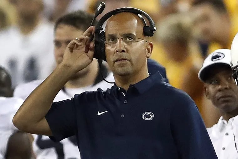 Penn State head coach James Franklin watches from the sidelines during the second half of an NCAA college football game against Iowa Saturday, Sept. 23, 2017, in Iowa City, Iowa. Penn State won 21-19.