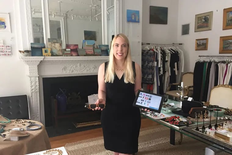 Natalie Vane specializes in turning vacant storefronts into launch pads for emerging artists and designers. She is shown here at her first co-sharing space at 1921 Walnut Street. (Michael Hinkelman / Daily News Staff)