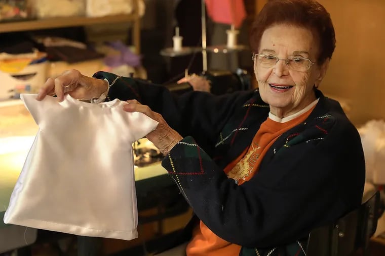 Mary Scarduzio, 95,  makes "angel" dresses,  burial gowns for infants, from wedding dresses. AKIRA SUWA / For The Inquirer.