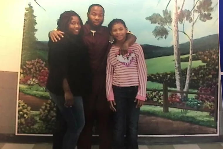 Dontia Patterson (center) with his daughter Samarah, now 11, and her mother, Shanell Allen.