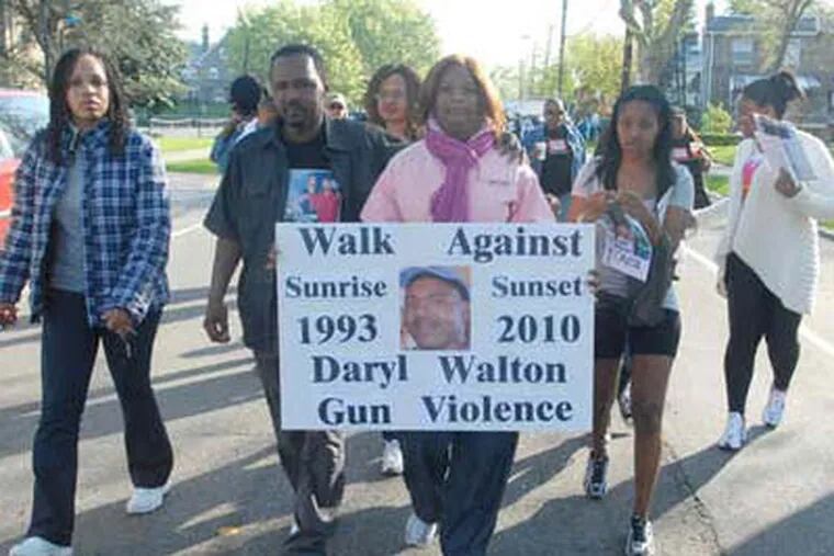 Many participants were on teams organized in memory of victims of gun violence, including the family of Daryl Walton, who was killed in Philadelphia in March. (Bob Williams / For the Inquirer)