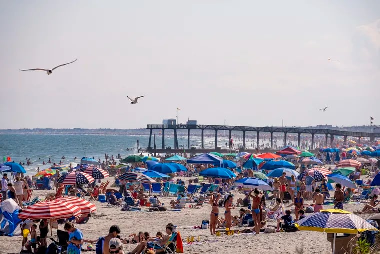 Beach goers packed the shoreline in Ocean City on July 4. Despite the coronavirus pandemic, the Fourth of July weekend brought large crowds to beaches and boardwalks along the South Jersey coast.