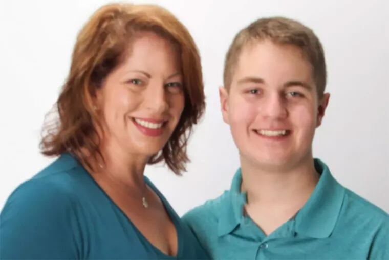 Amy C. Hughes with son Rion, whose life-threatening seizure went unexplained for days and seemed impervious to anticonvulsants.