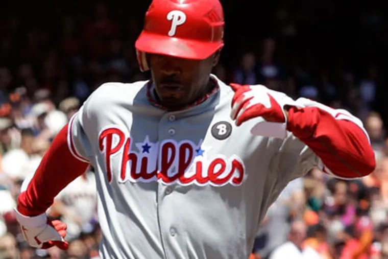 Free agent shortshop Jimmy Rollins is looking for a five-year deal. (Ben Margot/AP Photo)