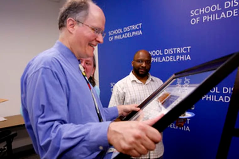 Paul Vallas, chafing at criticism, ducked a district event to mark his exit, but on his last day here accepted a gift from his staff.